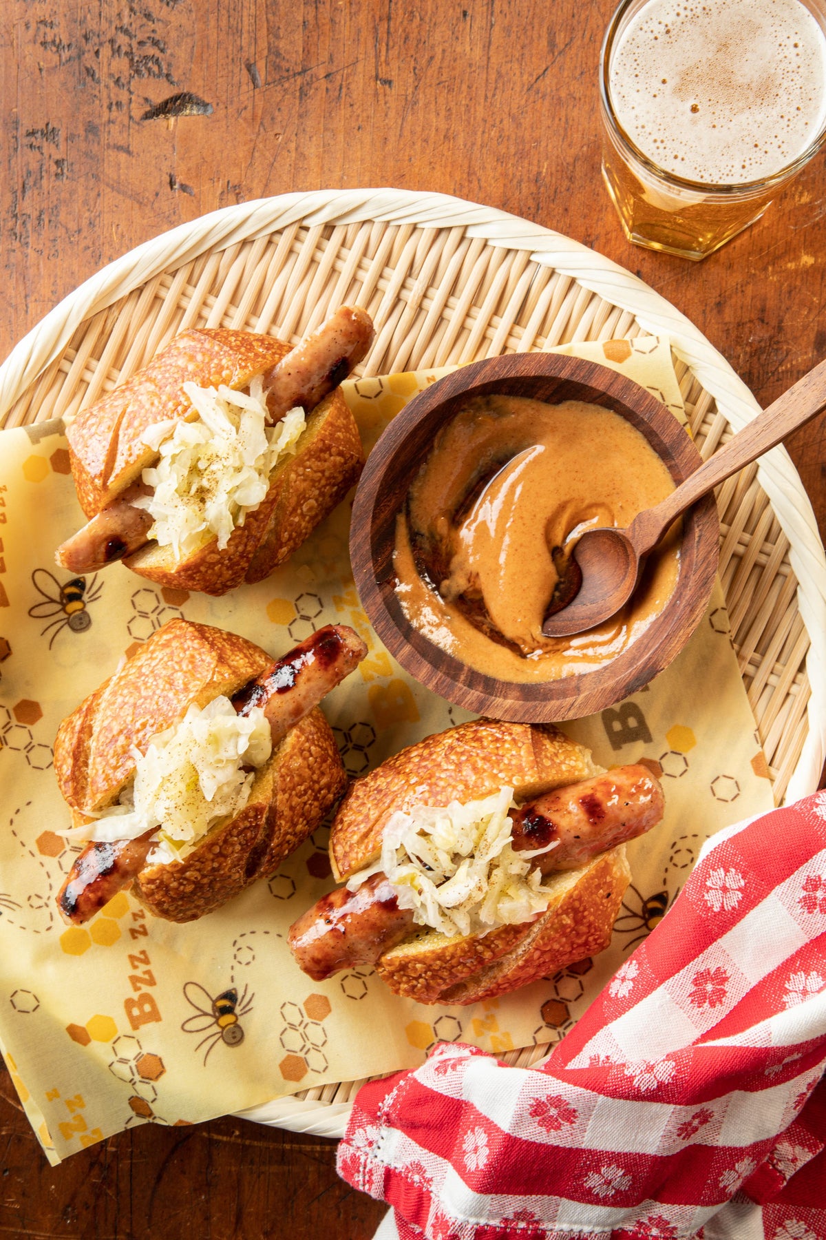 Mini Brats with Sauerkraut and Honey Hot Sauce