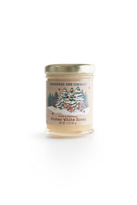 3 ounce winter white honey on a white background